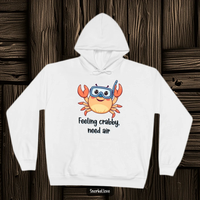 Funny crab character with snorkel, happily waving claws, depicted on a soft, warm hoodie for ultimate comfort and humor.